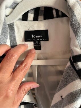 B.Wear Black and White Plaid Jacket